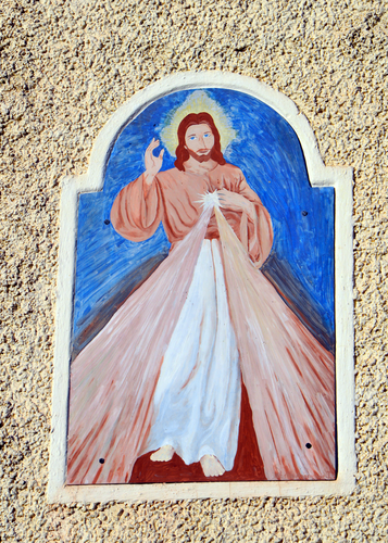 Tröbinger - Hausbild und Windfahne