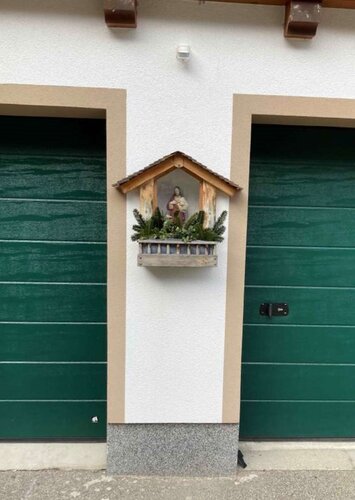 Plohhaus (Zensenschuster) - Hausstatue