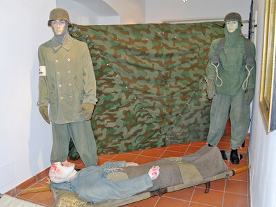 Szenische Darstellung: Abtransport des Verwundeten